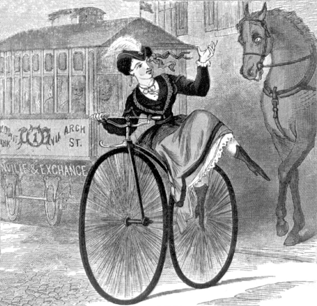 Woman Riding Velocipede, 1869