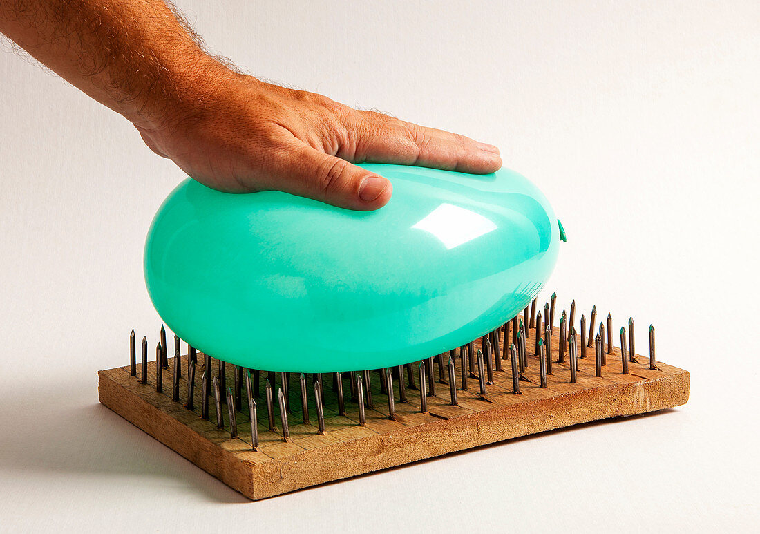 Balloon on Bed of Nails