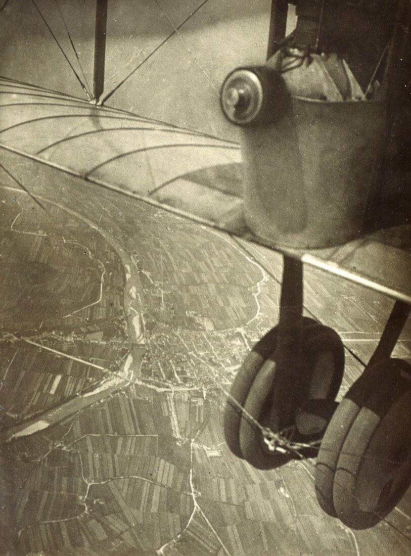 Aerial of Cityscape and Airplane Wheels, WW1 Era