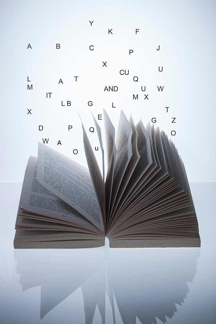Open book with letters, conceptual image