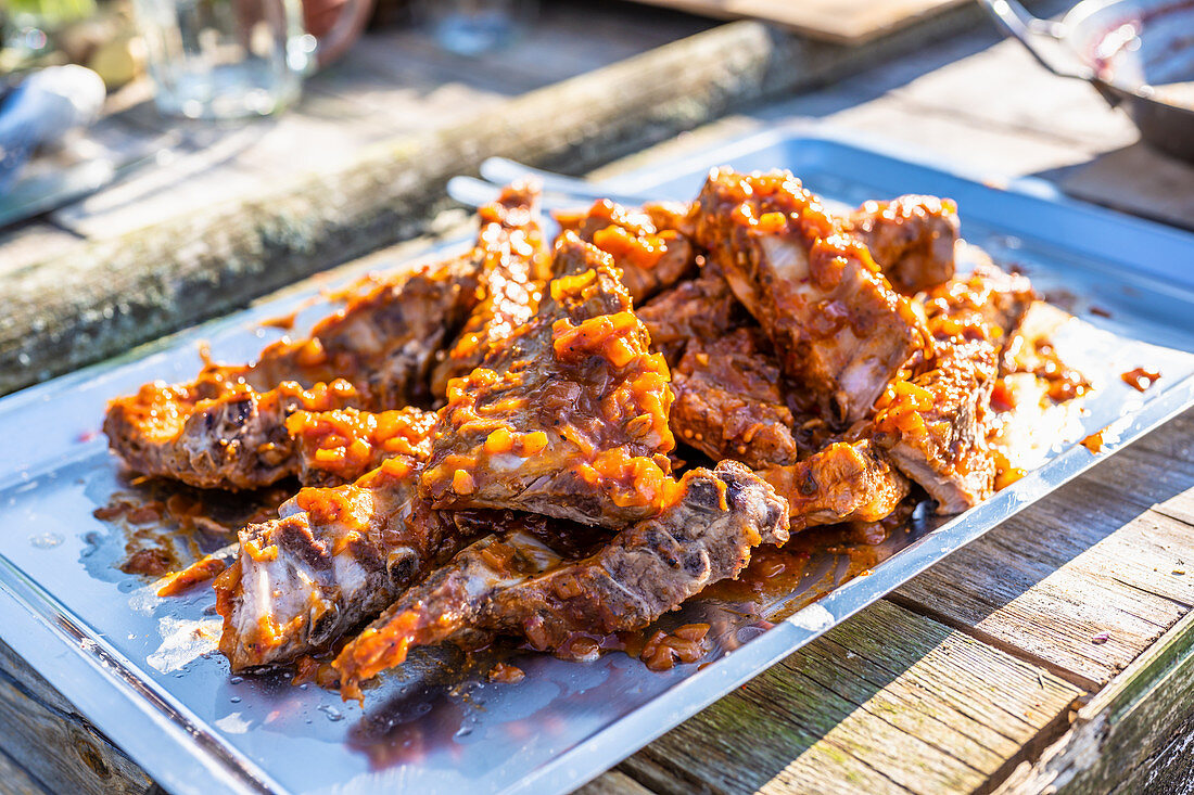 Cooked spare ribs marinated with BBQ sauce