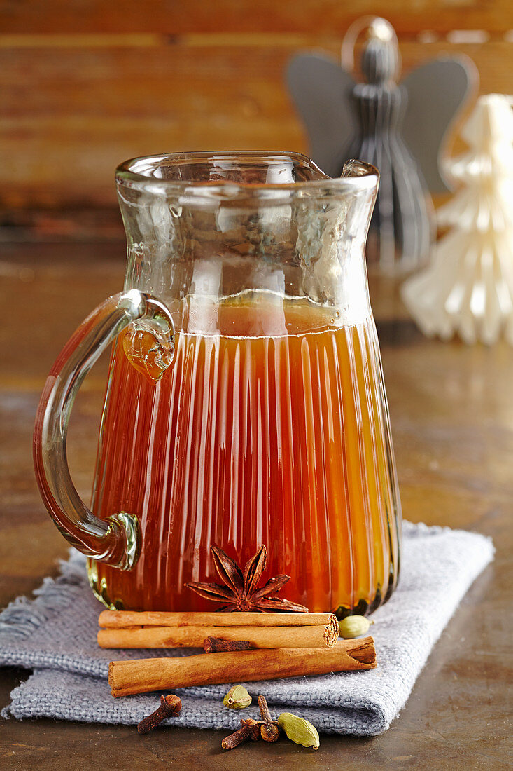 Christmas spiced syrup with cinnamon, cloves and cardamom for punch and hot drinks
