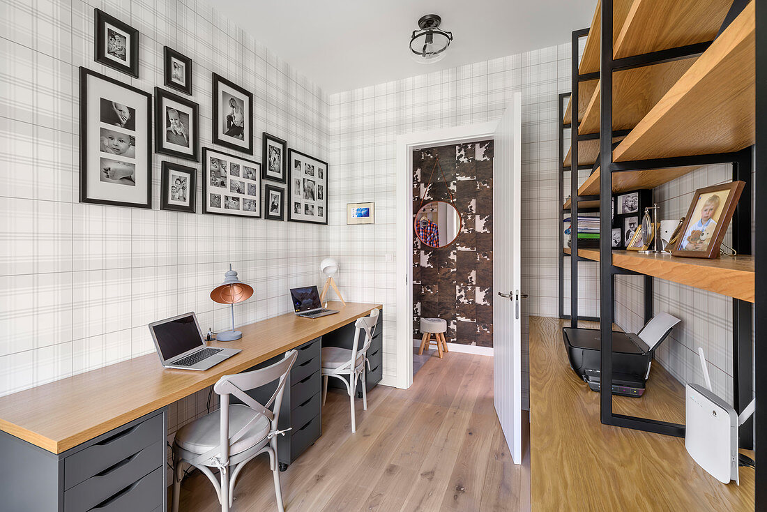 Tartan wallpaper and double desk in study