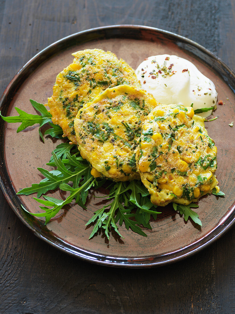 Amaranth and corn fritters with rocket