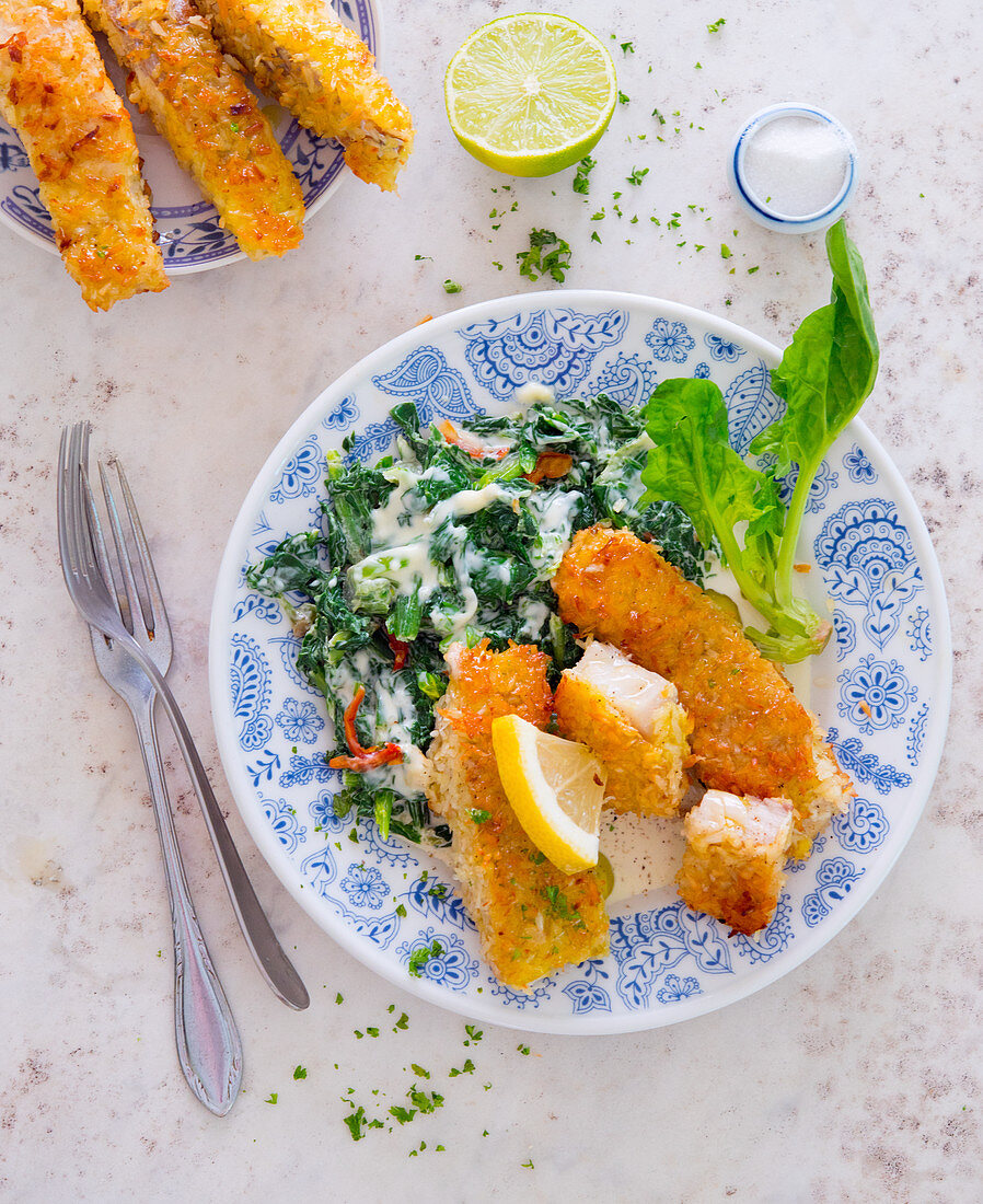 Fish fingers with creamy spinach