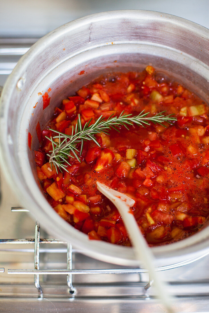 Tomato sugo on a camping stove