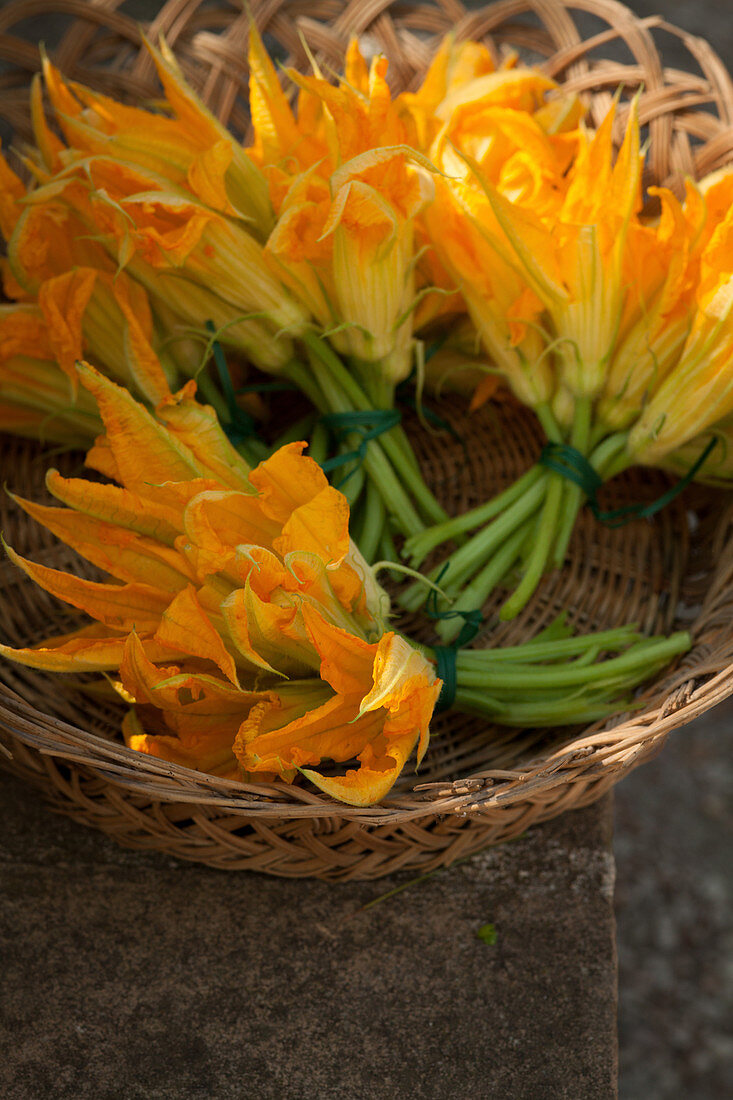 Courgette flowers in a basket