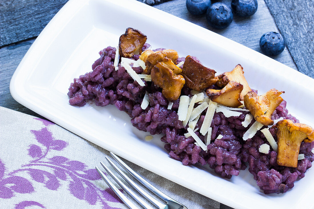 blueberry risotto with chanterelle mushrooms and shaved Parmesan