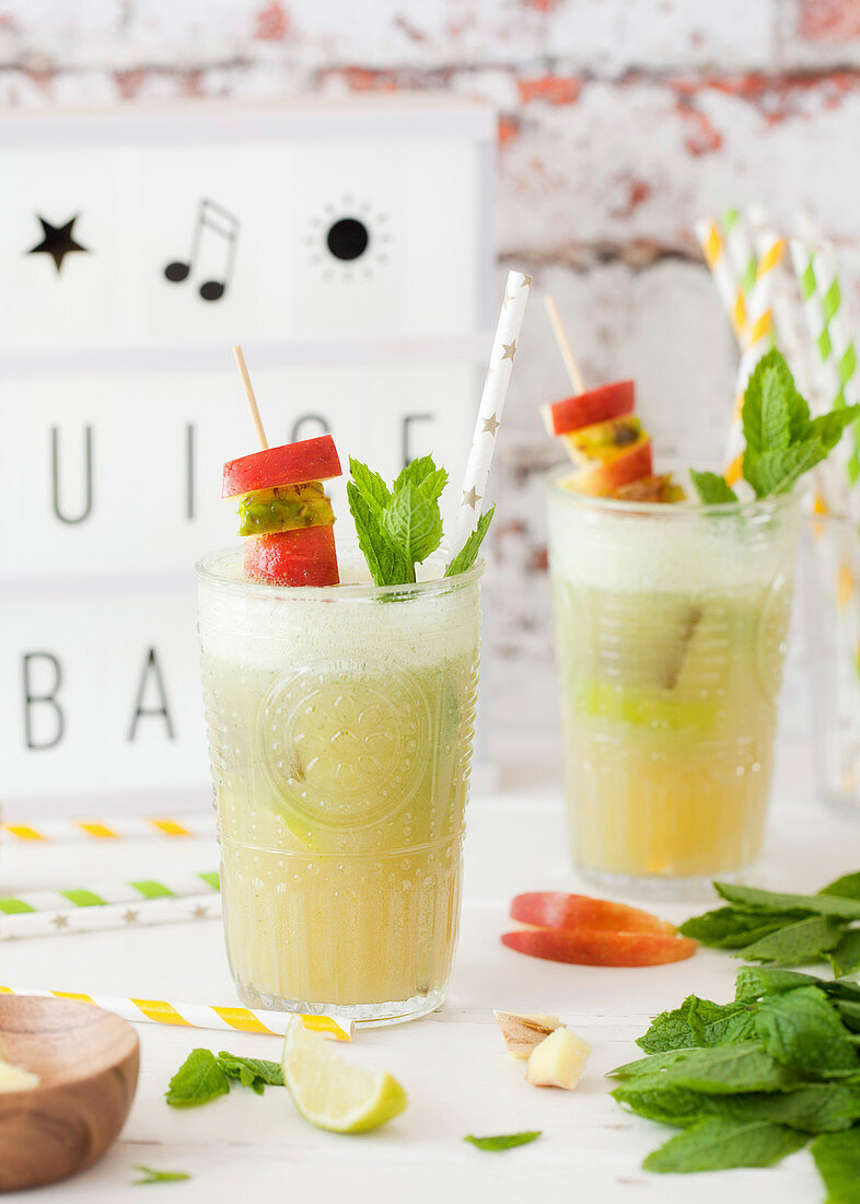 Glasses of Apple, Pineapple and Mint juice