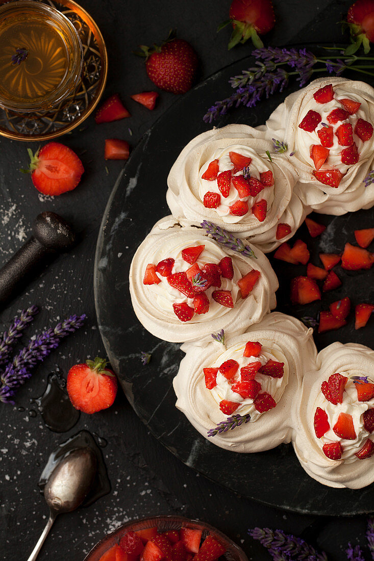 Meringue Nests with cream, strawberries and lavender