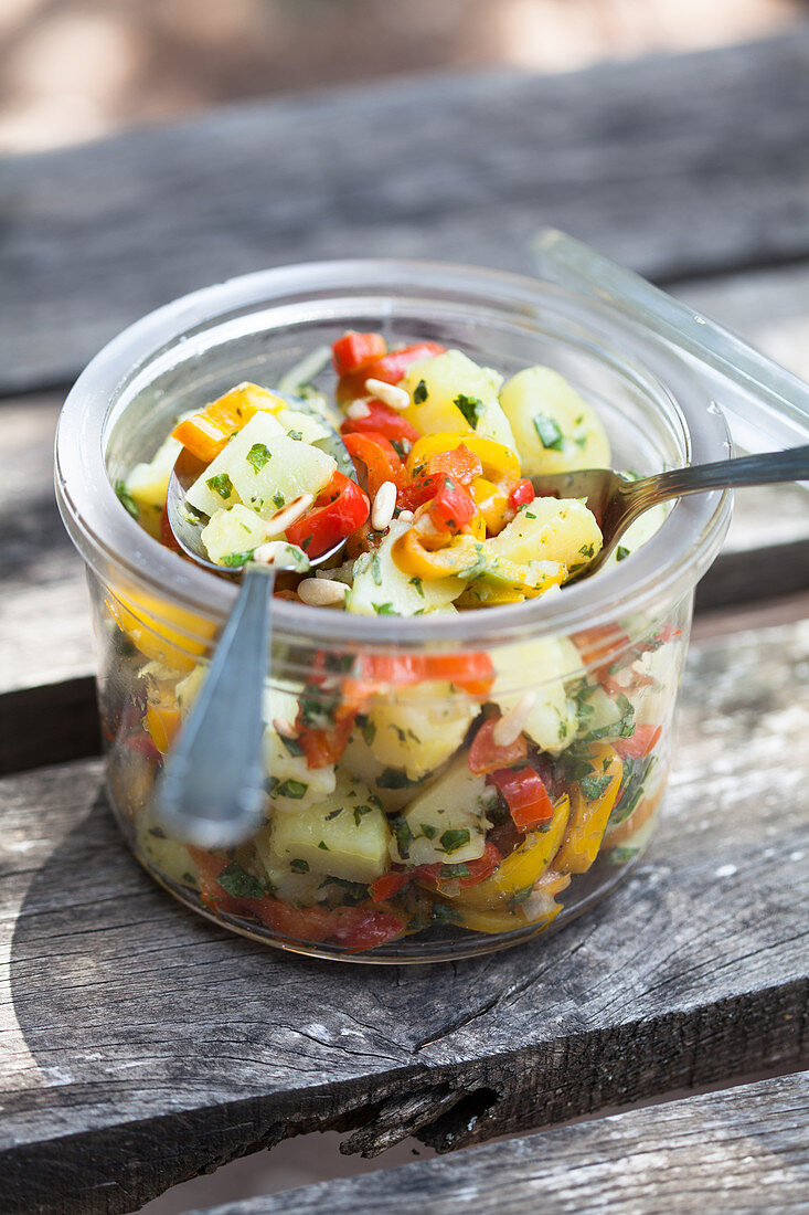 A jar of potato and pepper salad