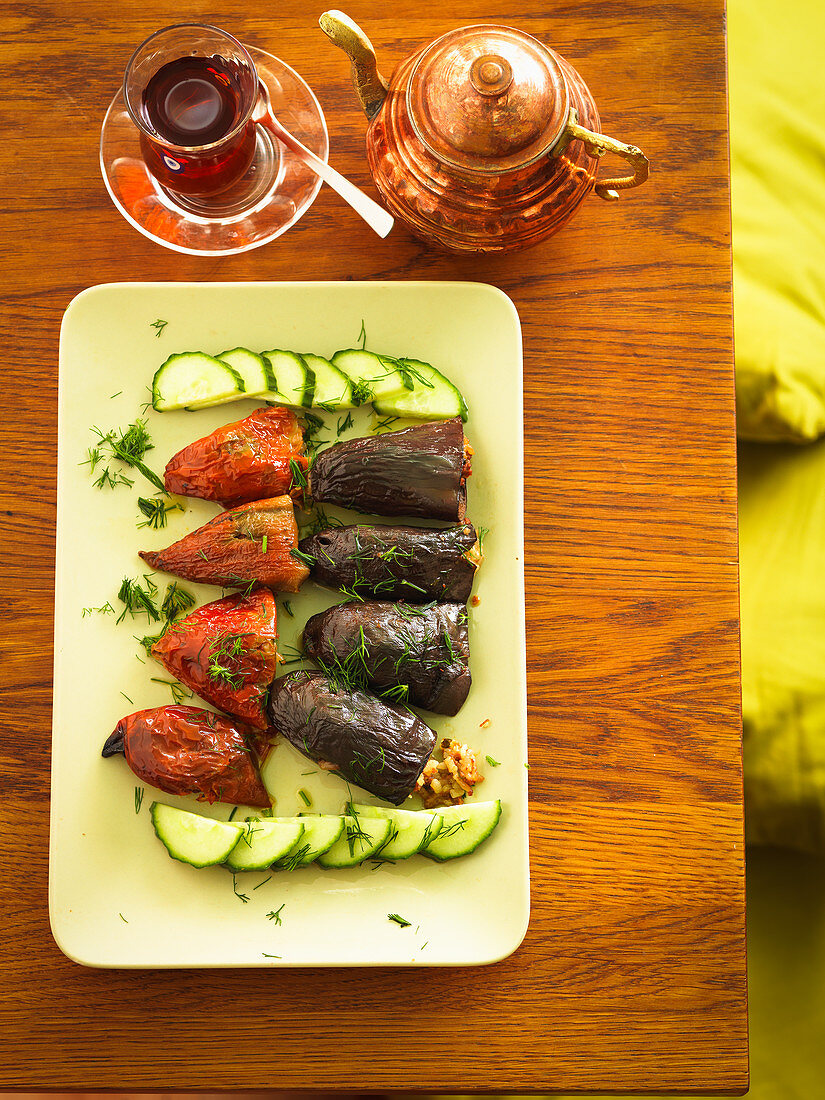 Stuffed peperoni and aubergines with sliced cucumber