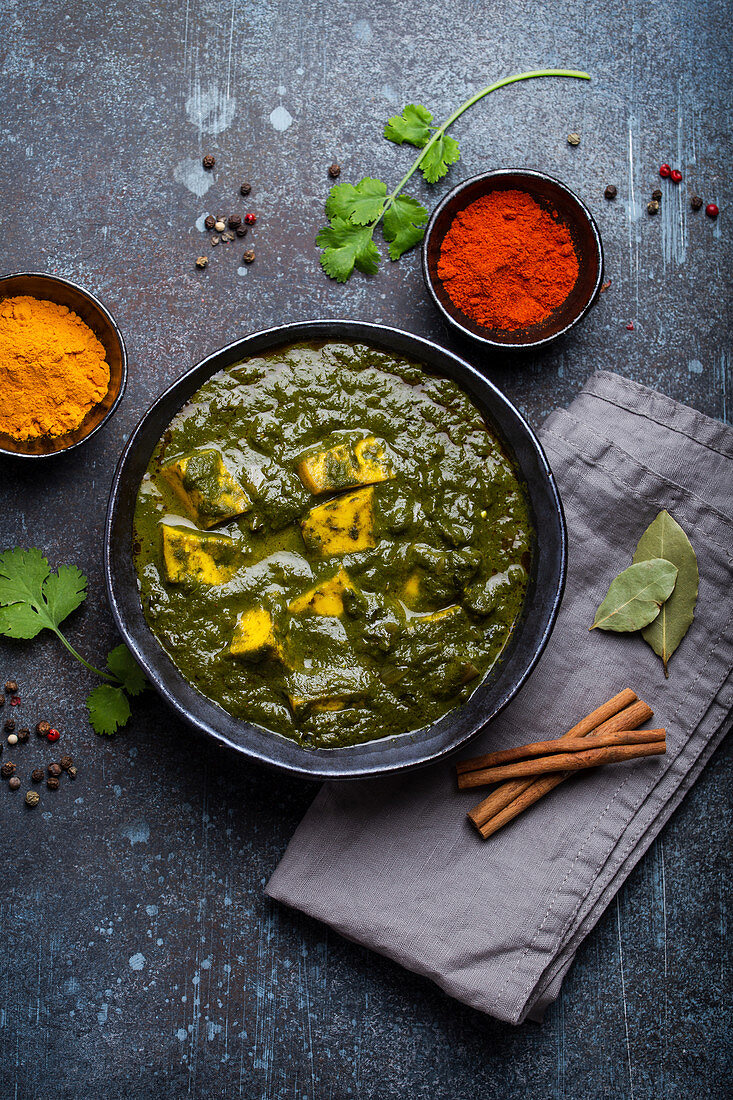 Palak paneer, traditional vegetarian Indian dish with cheese paneer, pureed spinach and spices