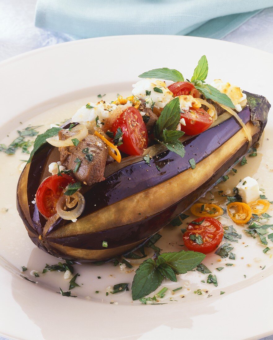 Roasted Whole Eggplant Stuffed with Beef; Tomatoes; Peppers and Onions
