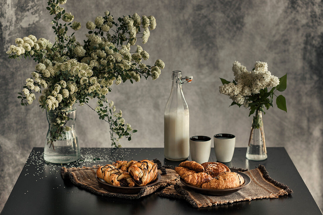 Fresh baked croissant on the black table