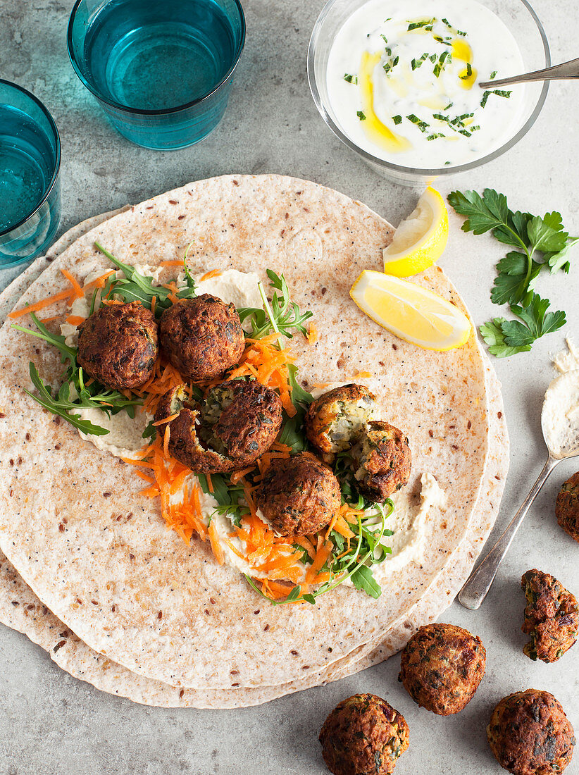 Falafel Wraps with hummus and tzatziki