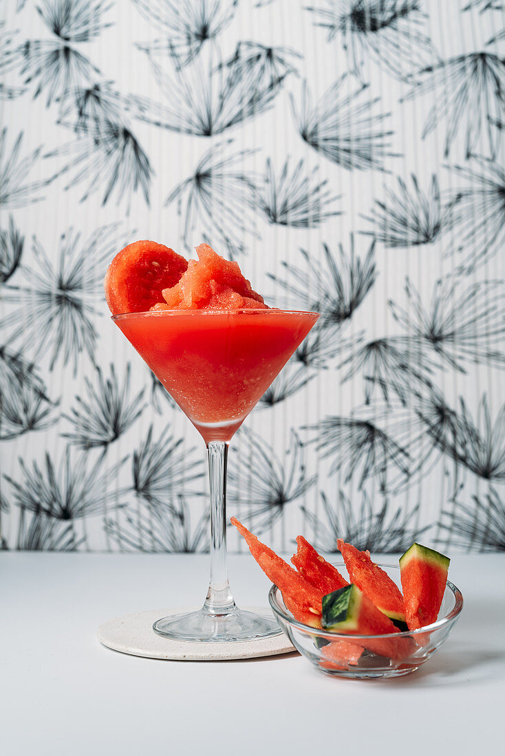 Fresh watermelon Daiquiri, refreshing cocktail in glass cup on light background