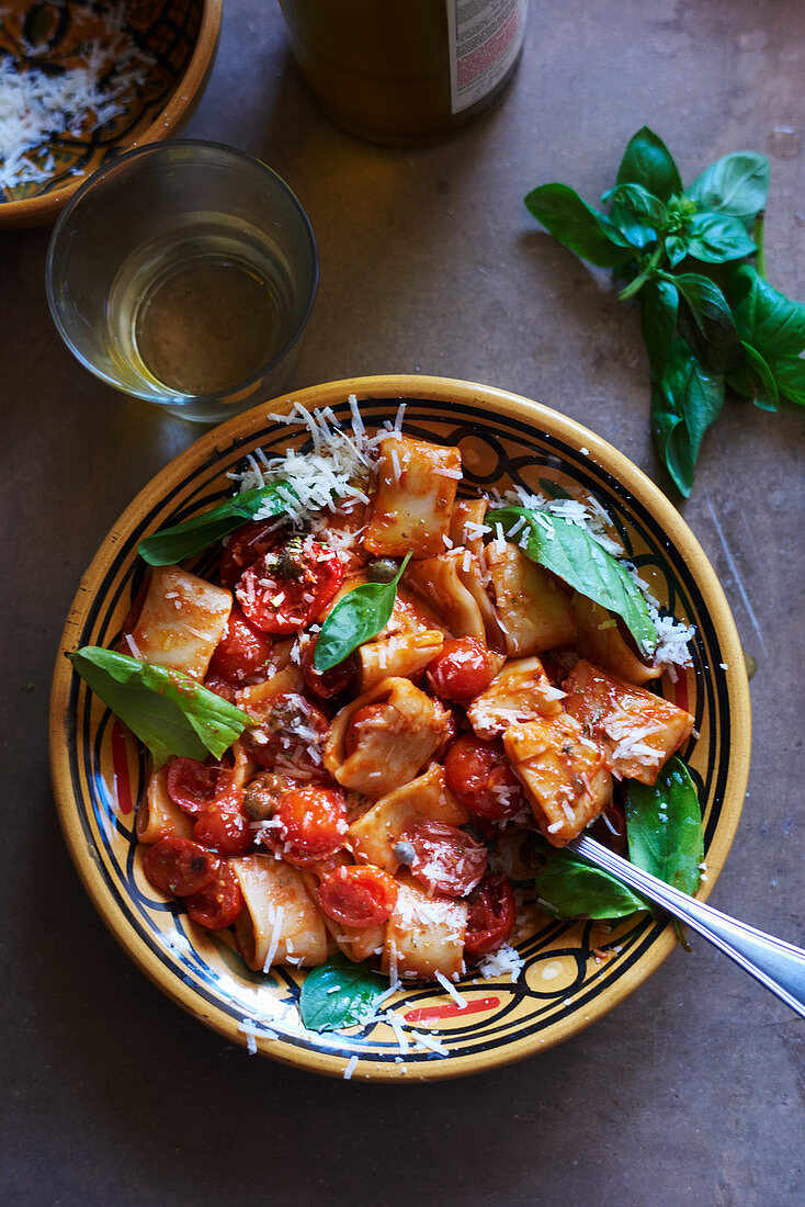 Pasta with tomatoe basil, Capers and Parmesan cheese