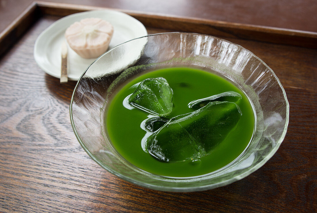 Matcha with ice cubes, served with Wagashi (Japan)