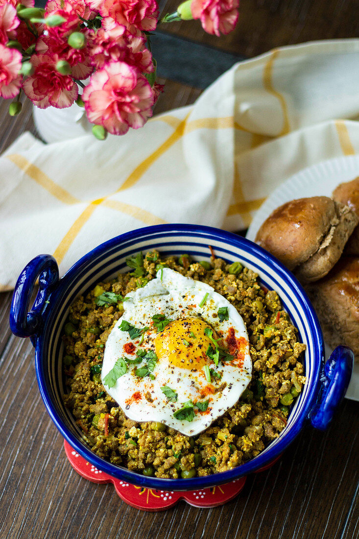 Mutton Keema Ghotala (spicy mutton mince) with a fried egg (India)