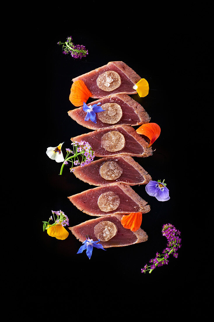 Seared tuna with truffles and edible flowers