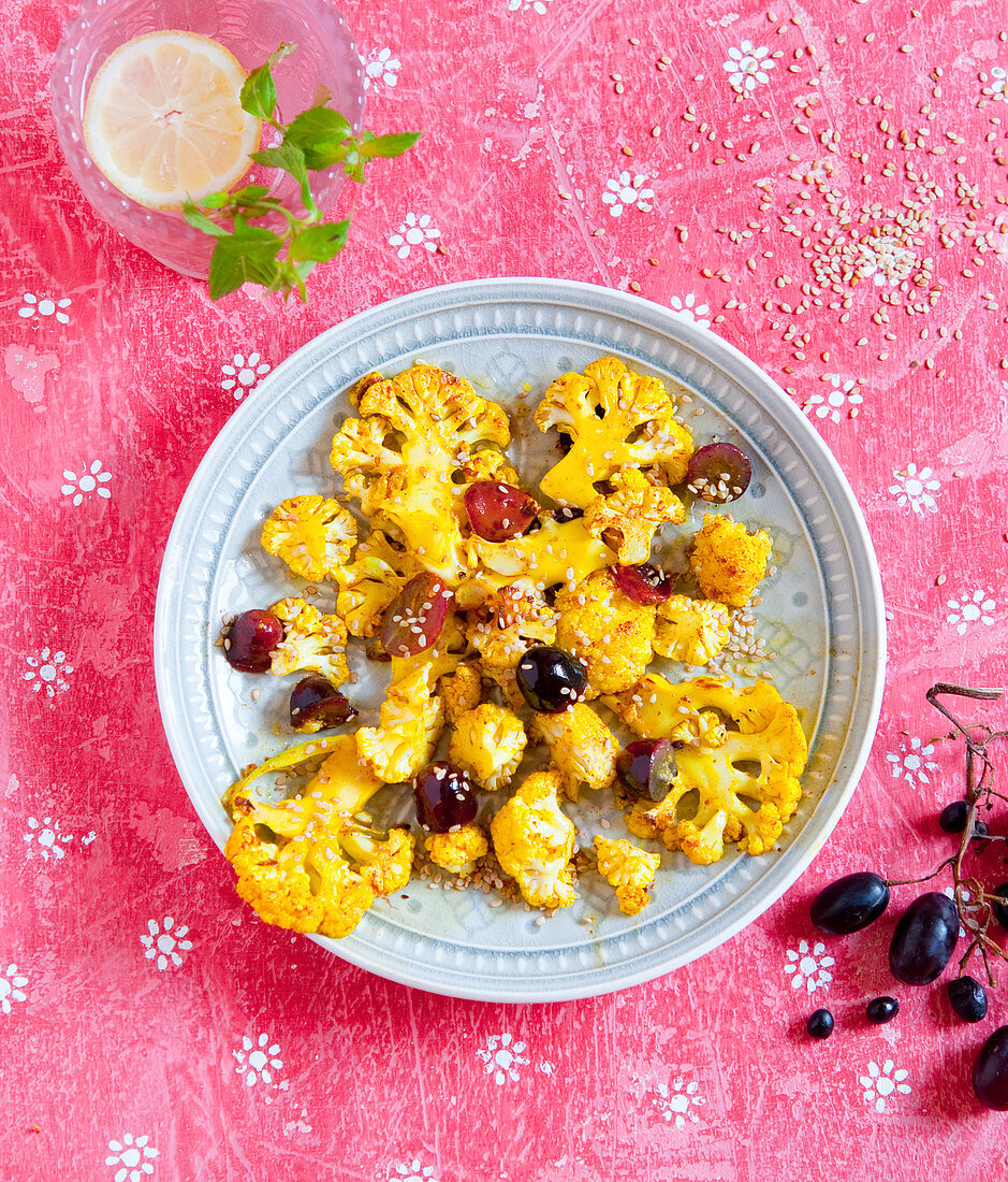 Turmeric cauliflower with grapes and sesame