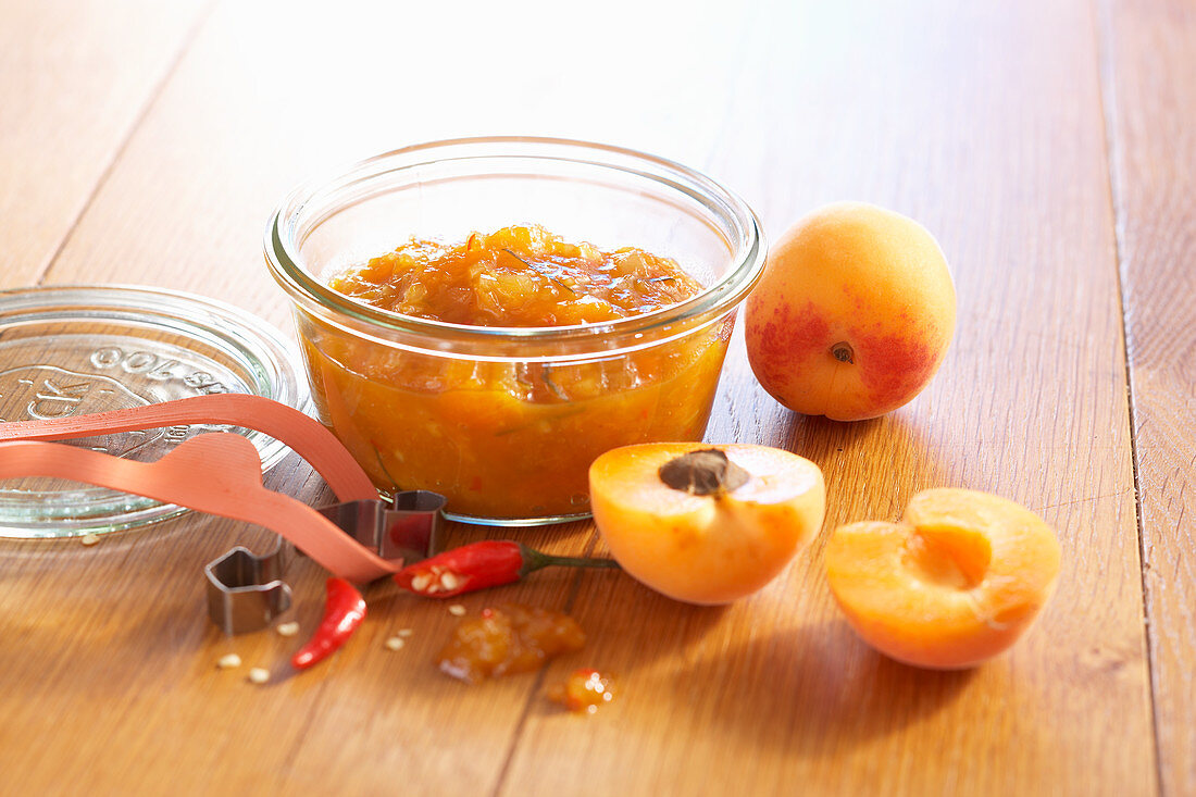 Apricot and ginger chutney with fresh chili in a mason jar