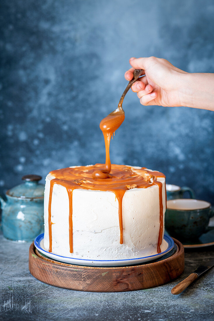 Caramel cake with thin nut layers