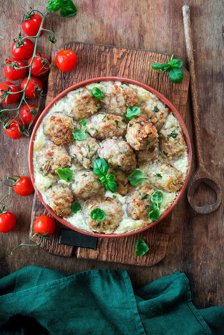 Rice meatballs baked in cream