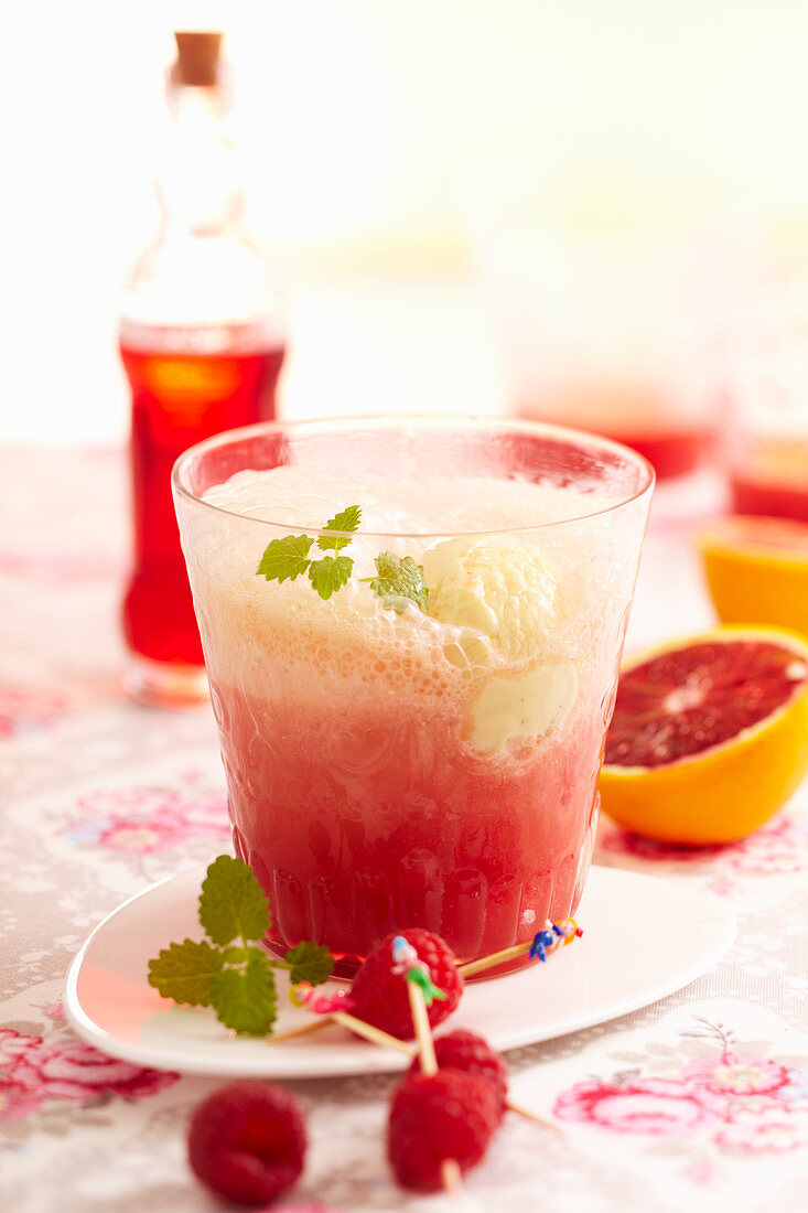 Blood orange cocktail with vanilla ice cream