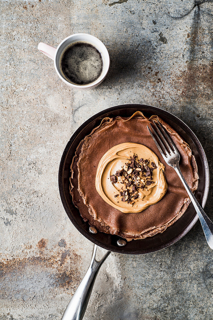 Cocoa pancakes with peanut butter and dark chocolate