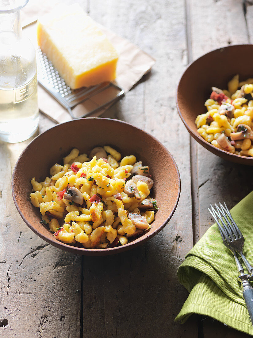 Corn Spätzle pasta with mushrooms and cheese