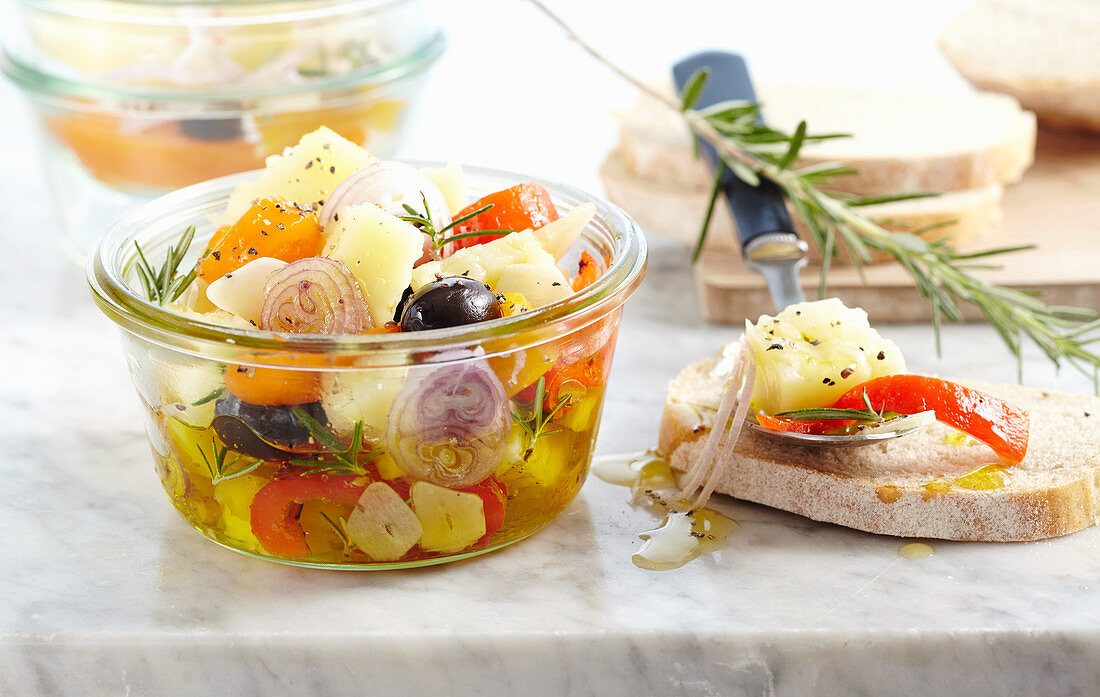Pickled manchego with peppers, shallots, olives and bread