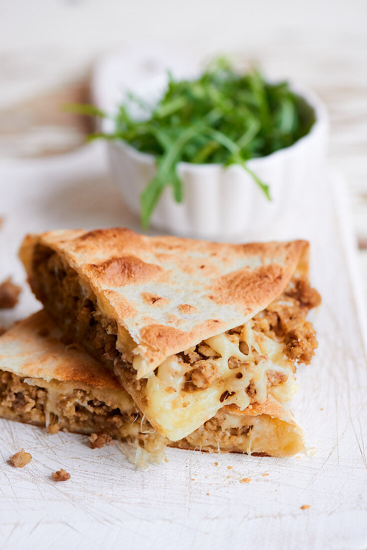 Minced meat and cheese Quesadilla with rucola
