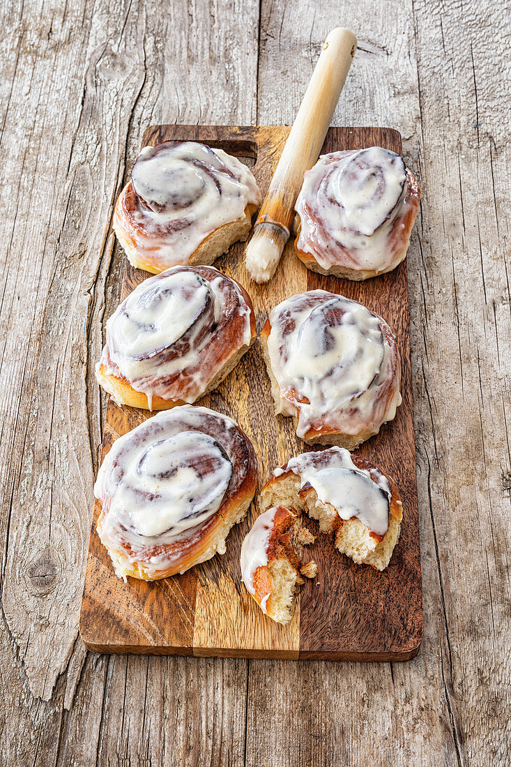 Cinnamon buns topped with cream cheese
