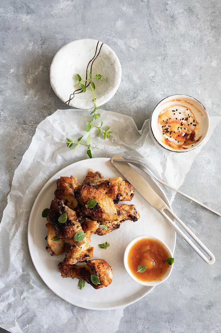 Grilled chicken wings with mango and lime chutney