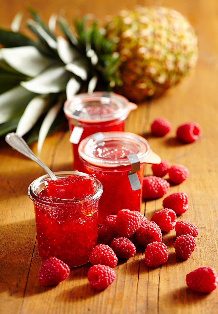 Jars of pineapple and raspberry jam