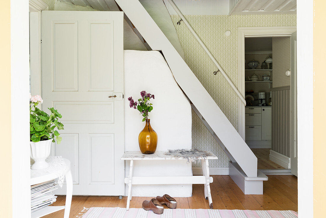 White, wooden, ships' ladder stairs in Swedish country house
