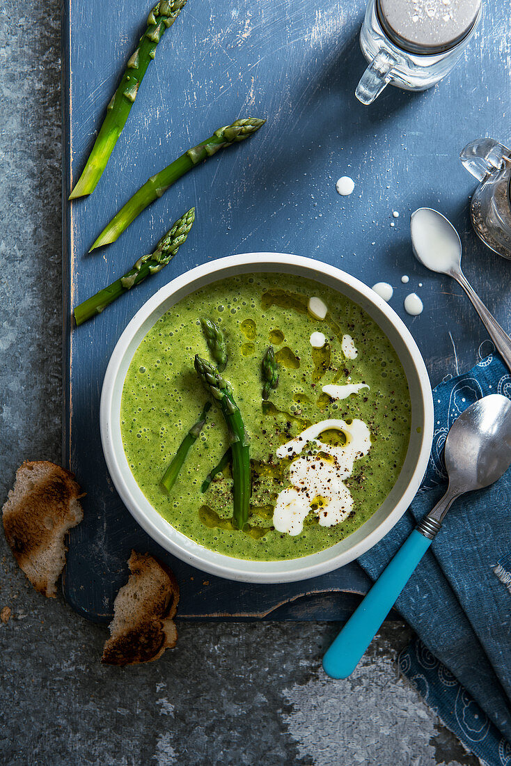 Asparagus veloute with fresh asparagus, olive oil and sour cream