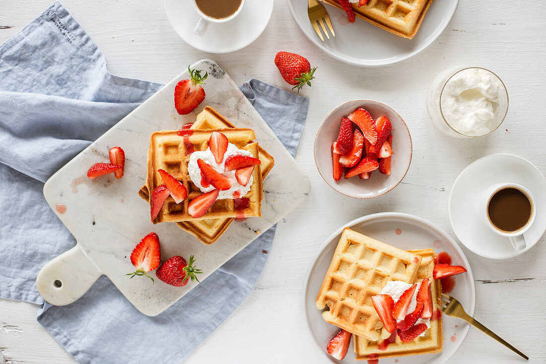 Yeast waffles with strawberries and cream