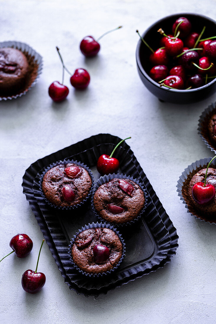 Chocolate muffins with cherries