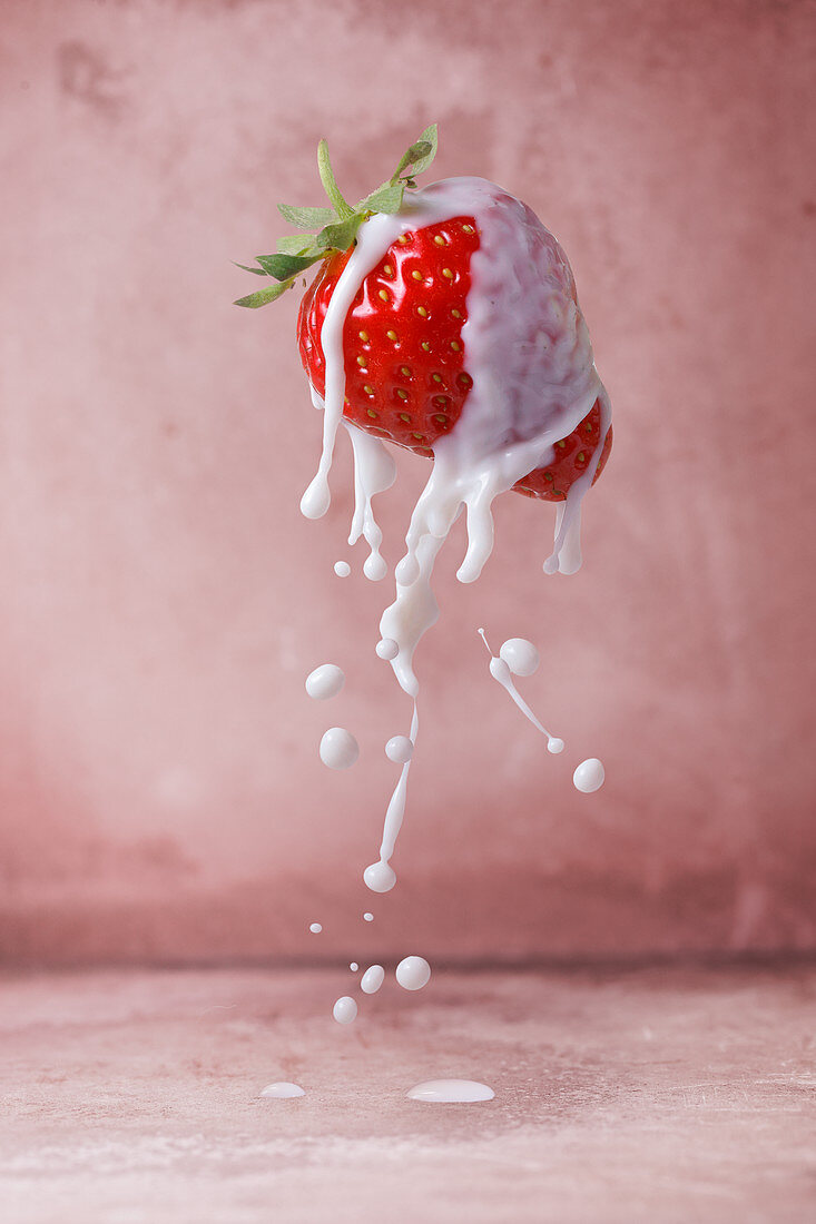 Strawberry with a milk splash