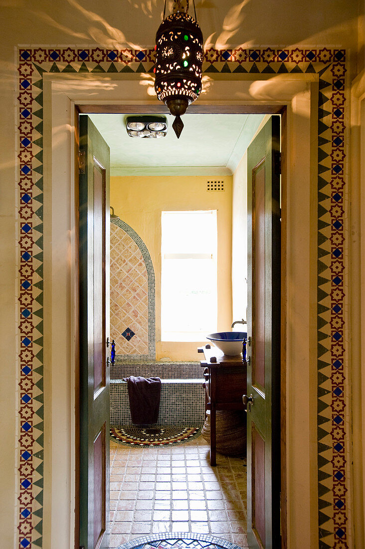 Washstand and bathtub in Oriental bathroom