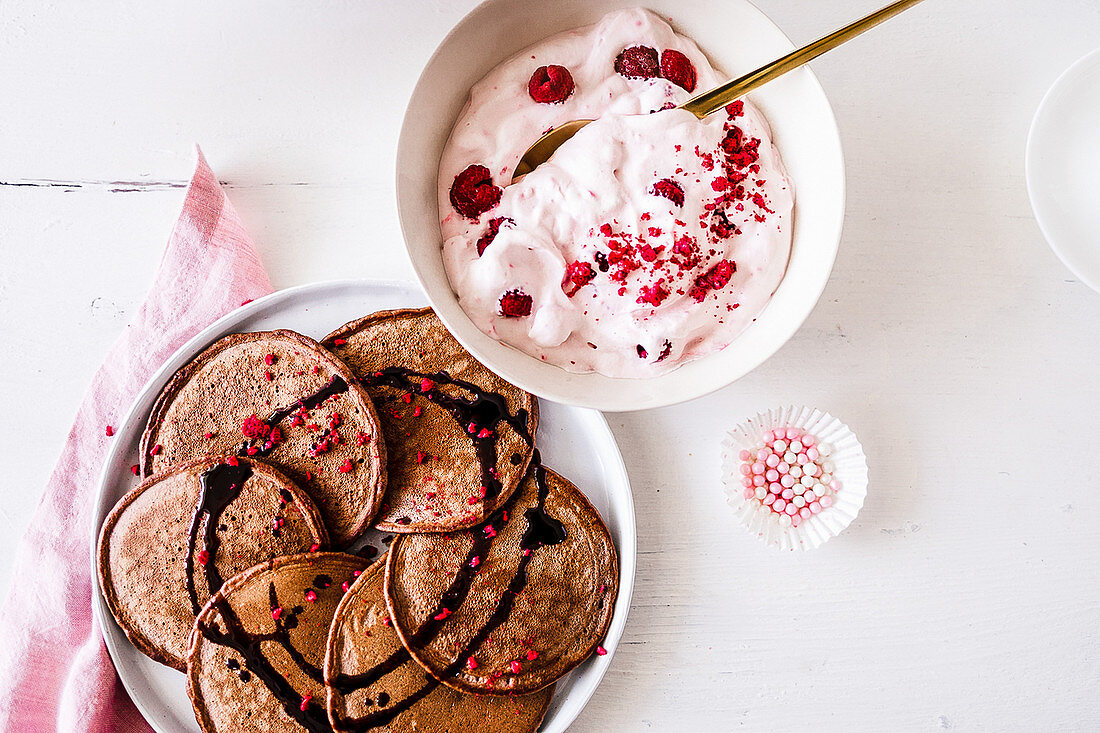 Chocolate pancakes with raspberry cream