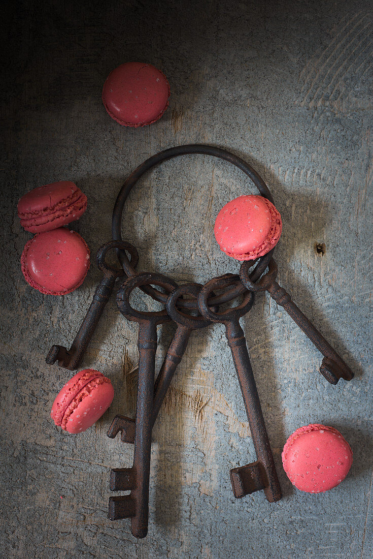 Still life with a rusty keychain and macarons
