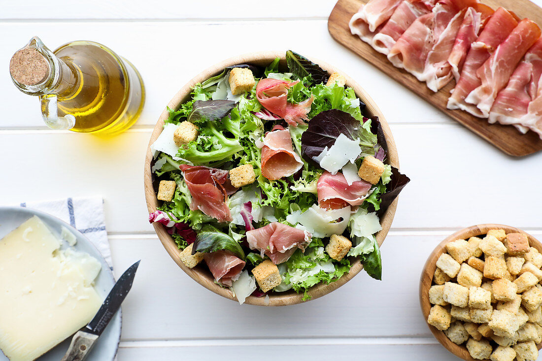 Delicious lettuce salad with bacon and croutons