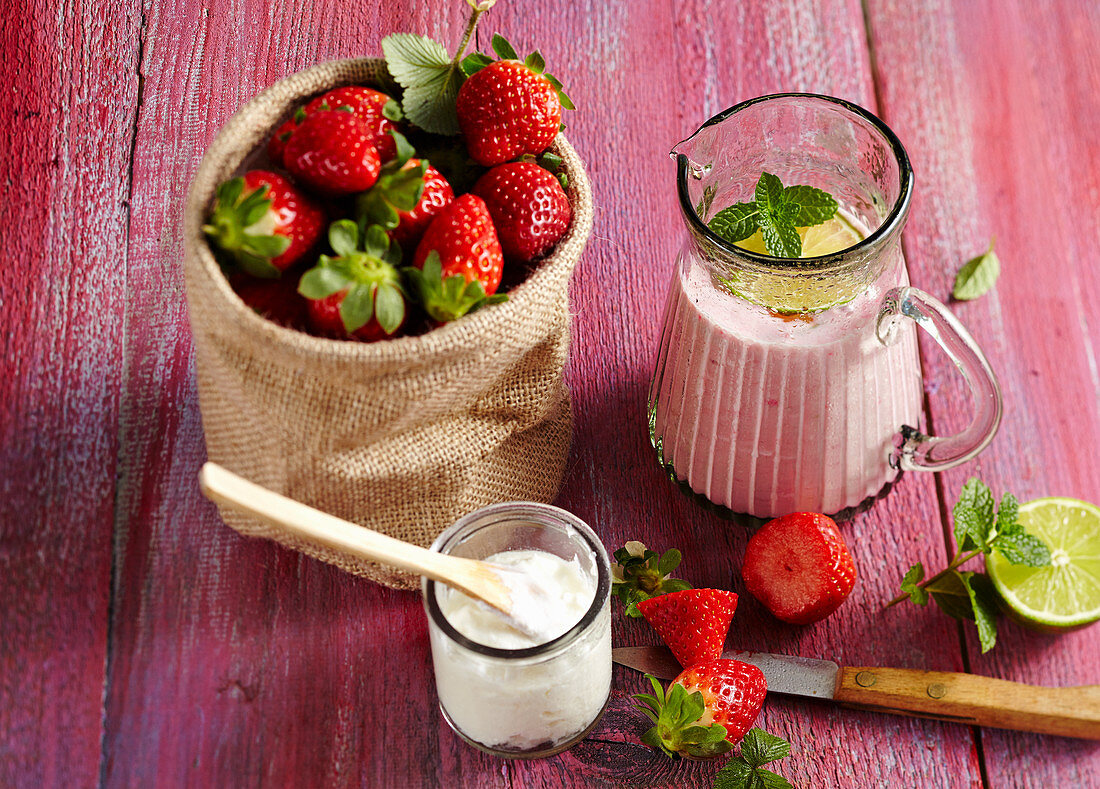 Lassi made from strawberries, natural yoghurt and milk