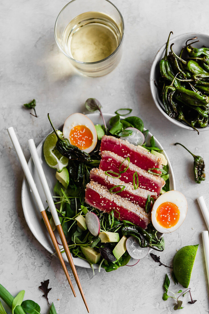 Seared tuna, with shisito peppers, watercress, and soft boiled eggs
