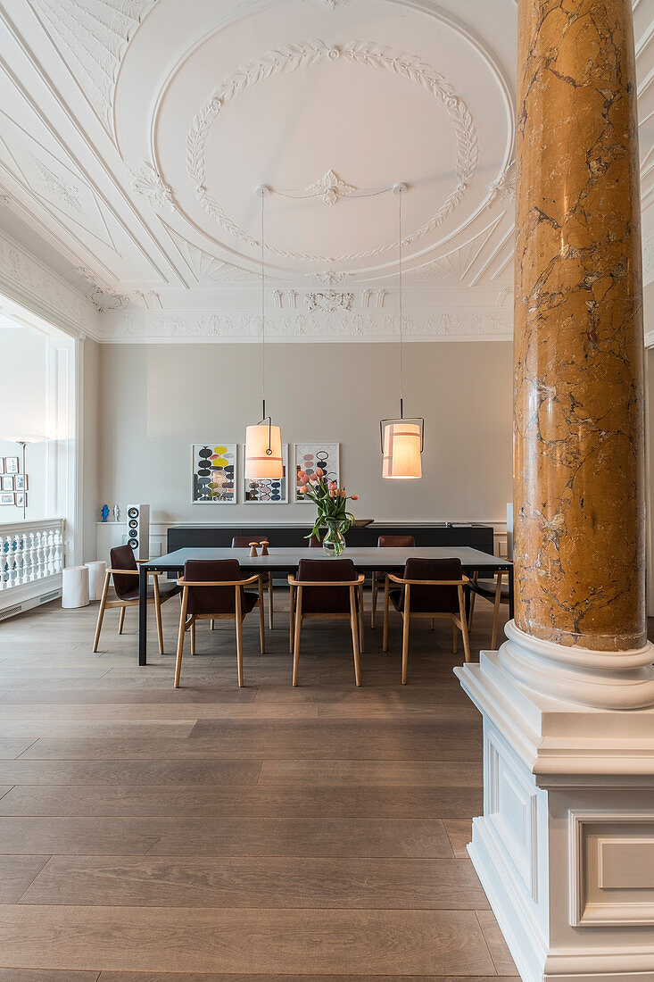 Open-plan interior with stucco and pillars in Wilhelmine-era villa