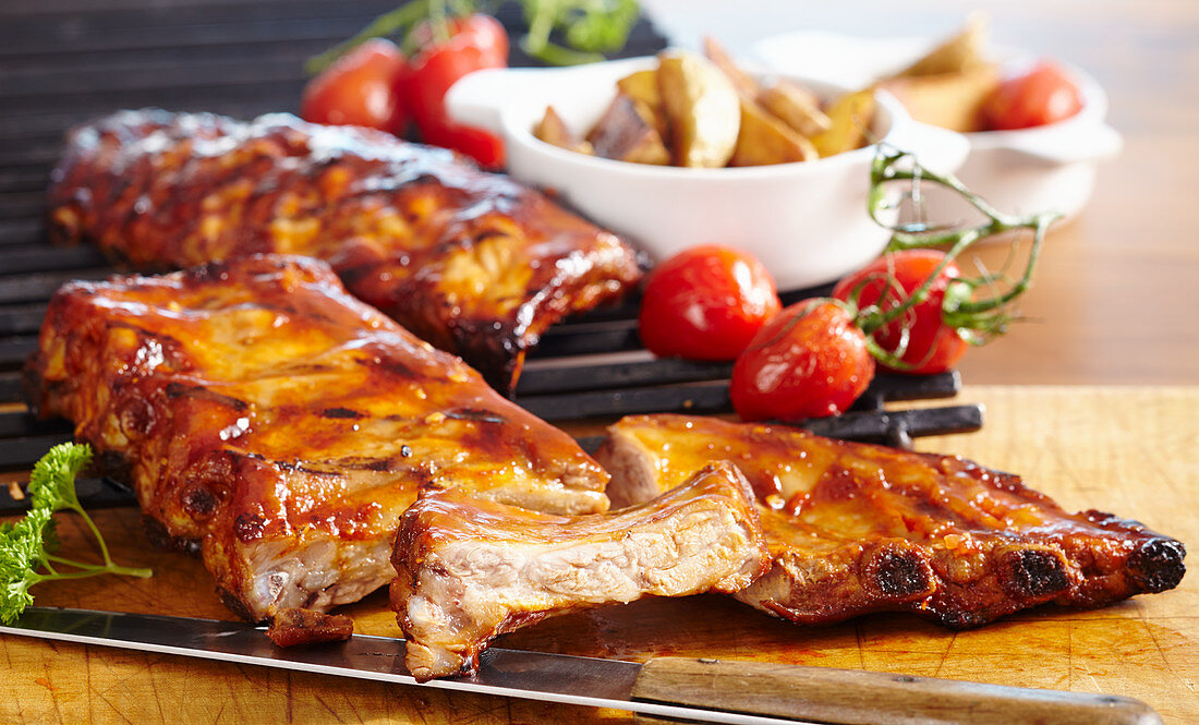 Grilled spare ribs in a BBQ marinade with roast potatoes